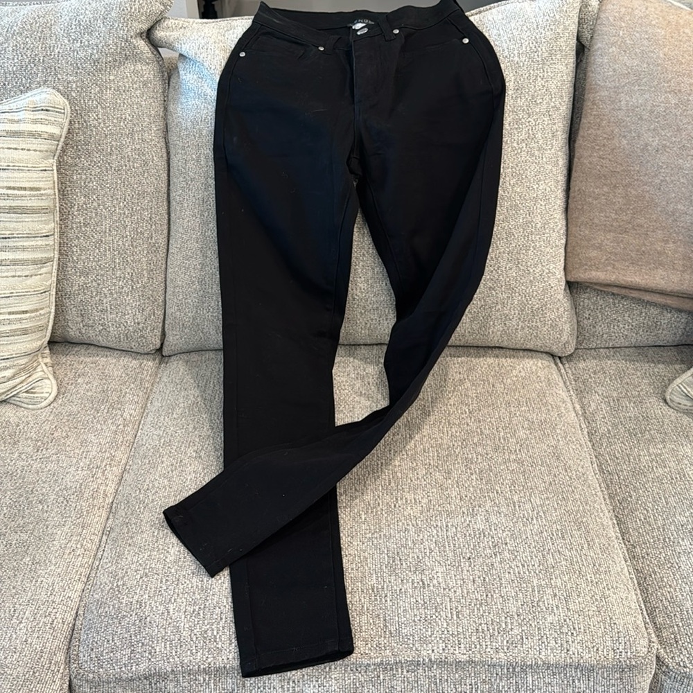Brand New black tight fitting jeans.